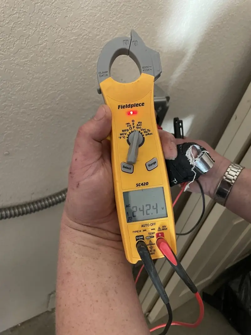 Voltage testing with clamp meter during Circuit Breaker Repair in Swissvale
